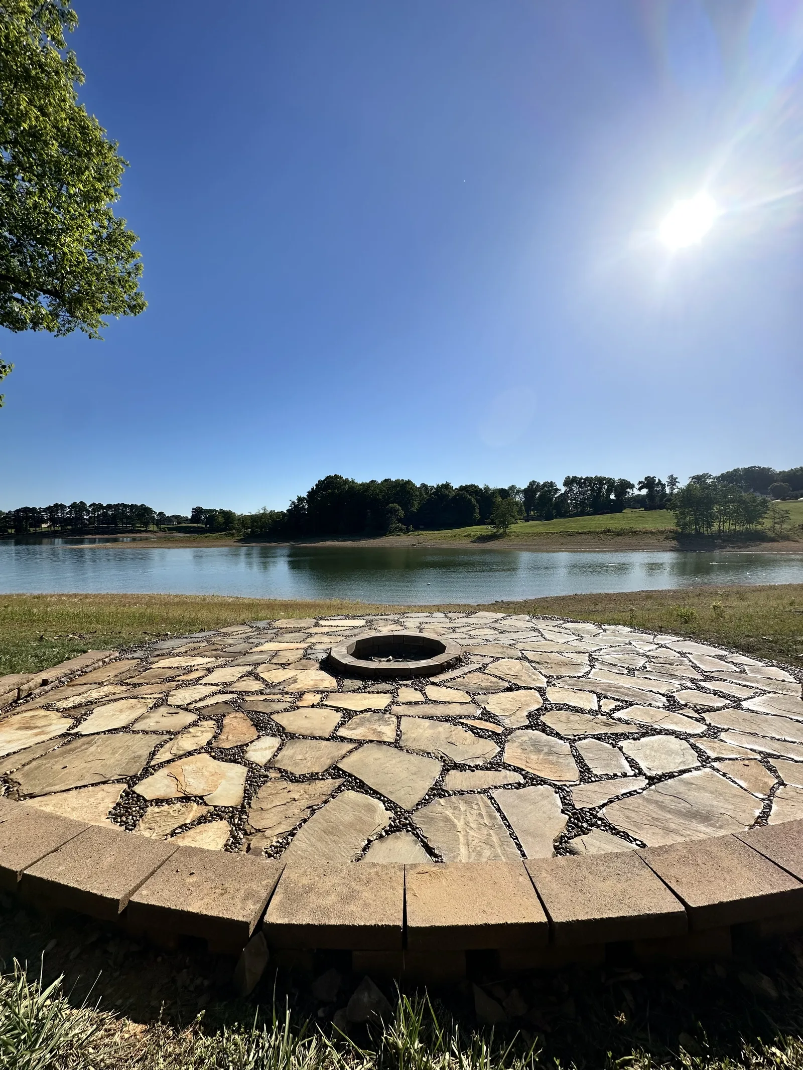Custom stone fire pit installation Maryville TN — hardscape contractor Landscape Around You