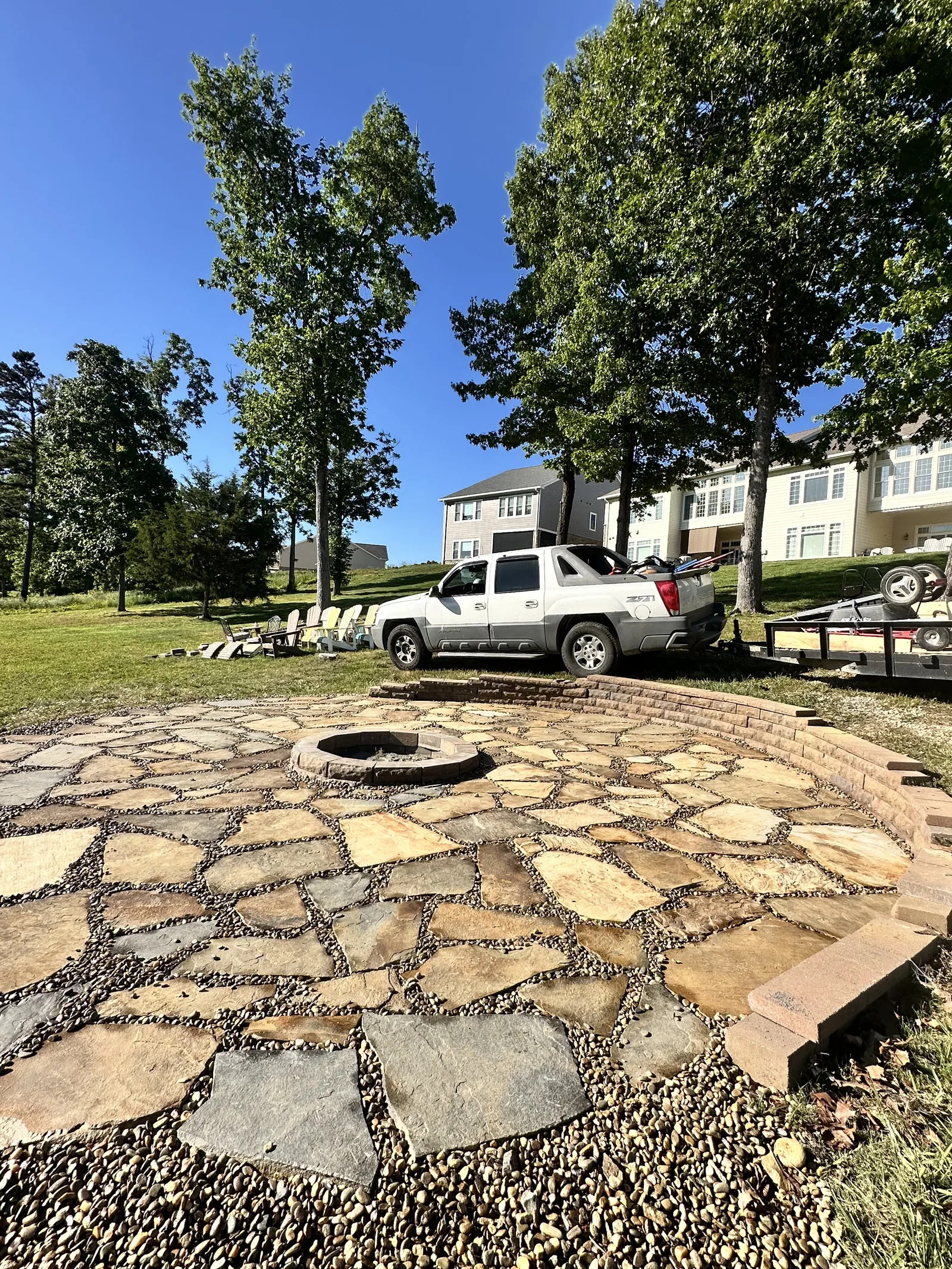 Flagstone patio with fire pit Knoxville TN — outdoor living space hardscape