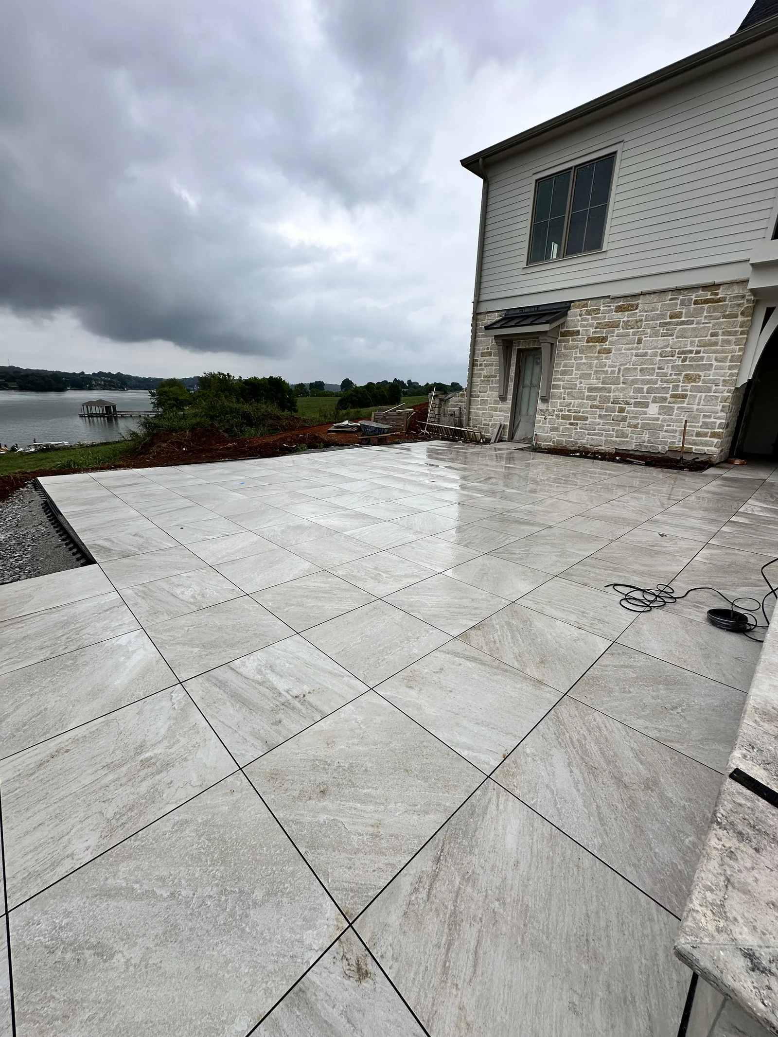 Luxury stone patio installation Farragut TN — hardscape contractor Landscape Around You